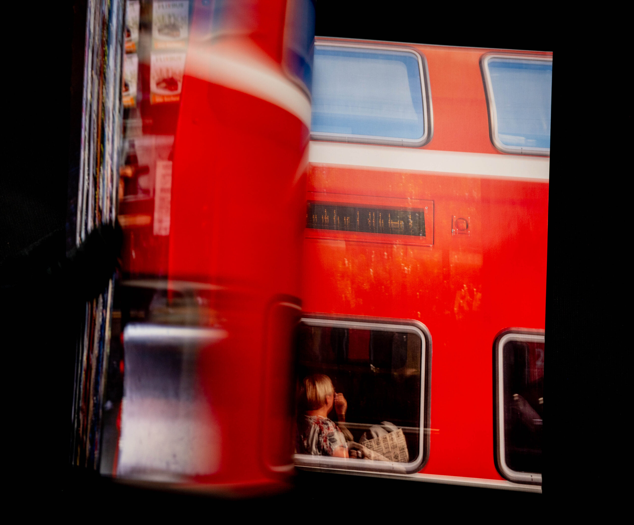 Open book showing image of train windows